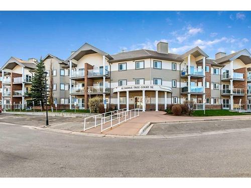 116-92 Saddletree Court Ne, Calgary, AB - Outdoor With Balcony With Facade