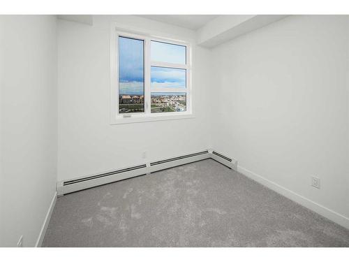 1305-55 Lucas Way Nw, Calgary, AB - Indoor Photo Showing Other Room