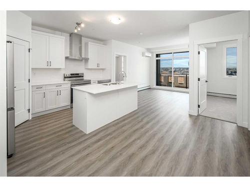 1305-55 Lucas Way Nw, Calgary, AB - Indoor Photo Showing Kitchen With Double Sink