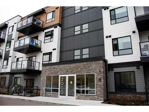 2101-42 Cranbrook Gardens Se, Calgary, AB - Outdoor With Facade