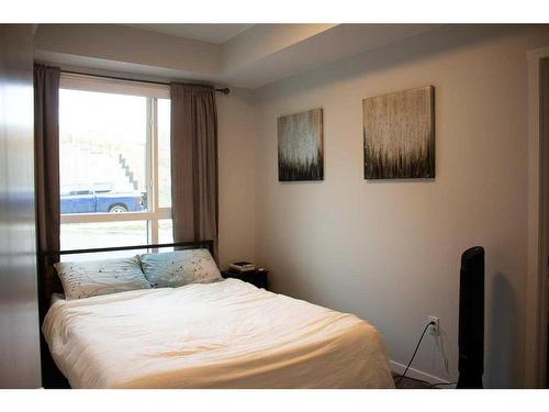 2101-42 Cranbrook Gardens Se, Calgary, AB - Indoor Photo Showing Bedroom