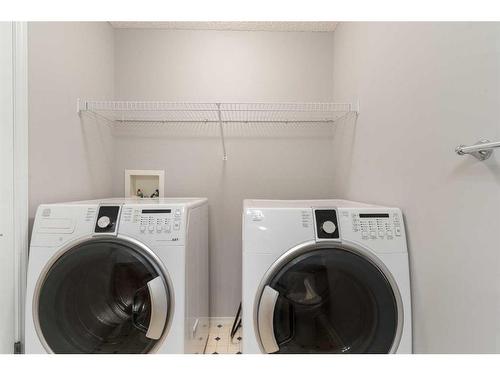 67 Inverness Gardens Se, Calgary, AB - Indoor Photo Showing Laundry Room