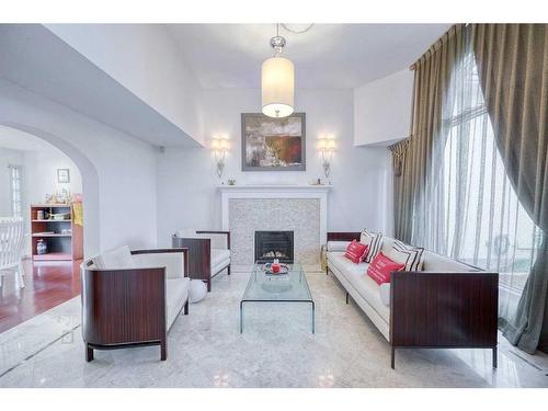 2628 Signal Ridge View Sw, Calgary, AB - Indoor Photo Showing Living Room With Fireplace