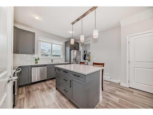 311 Carringvue Way Nw, Calgary, AB - Indoor Photo Showing Kitchen With Stainless Steel Kitchen With Upgraded Kitchen