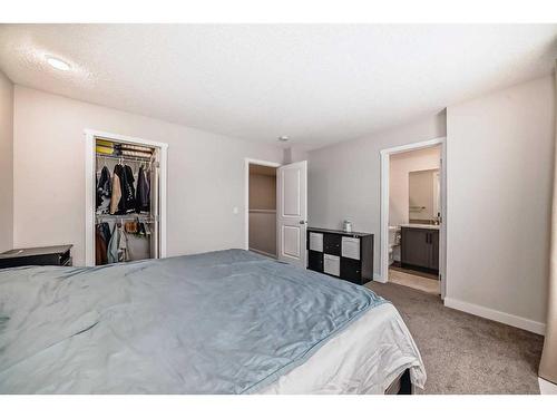 311 Carringvue Way Nw, Calgary, AB - Indoor Photo Showing Bedroom