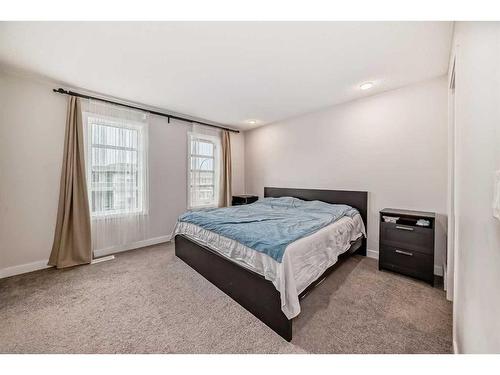 311 Carringvue Way Nw, Calgary, AB - Indoor Photo Showing Bedroom