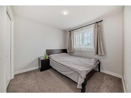 311 Carringvue Way Nw, Calgary, AB - Indoor Photo Showing Bedroom