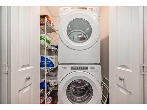 311 Carringvue Way Nw, Calgary, AB - Indoor Photo Showing Laundry Room