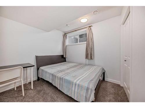 311 Carringvue Way Nw, Calgary, AB - Indoor Photo Showing Bedroom