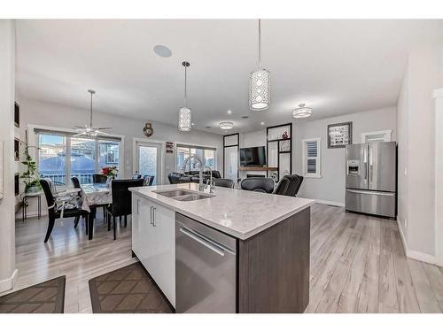 614 Kingsmere Way Se, Airdrie, AB - Indoor Photo Showing Kitchen With Double Sink With Upgraded Kitchen