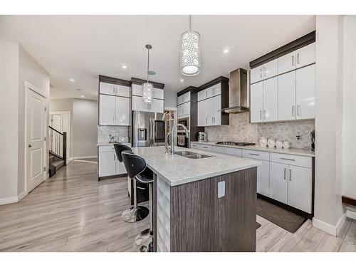 614 Kingsmere Way Se, Airdrie, AB - Indoor Photo Showing Kitchen With Upgraded Kitchen