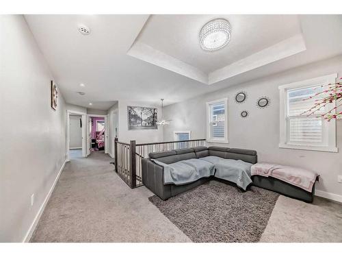 614 Kingsmere Way Se, Airdrie, AB - Indoor Photo Showing Bedroom