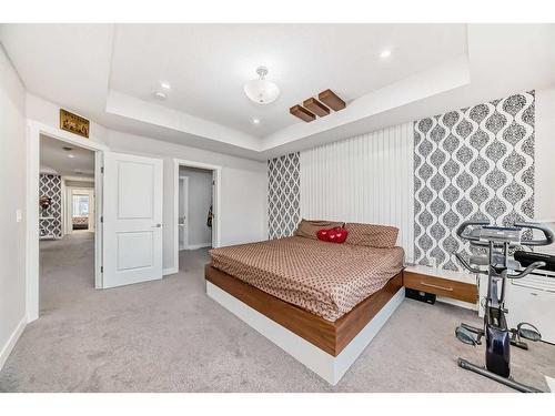 614 Kingsmere Way Se, Airdrie, AB - Indoor Photo Showing Bedroom