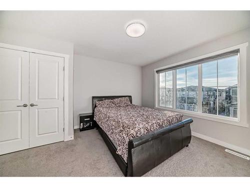 614 Kingsmere Way Se, Airdrie, AB - Indoor Photo Showing Bedroom