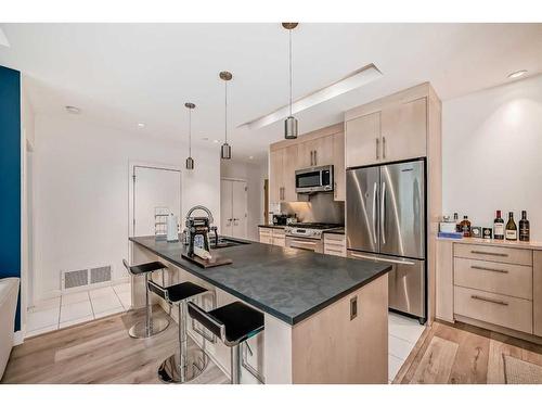 205-701 3 Avenue Sw, Calgary, AB - Indoor Photo Showing Kitchen With Stainless Steel Kitchen With Upgraded Kitchen