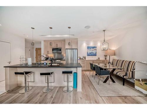 205-701 3 Avenue Sw, Calgary, AB - Indoor Photo Showing Kitchen With Stainless Steel Kitchen With Upgraded Kitchen