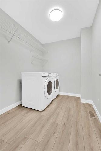 138 Cornerbrook Crescent Ne, Calgary, AB - Indoor Photo Showing Laundry Room