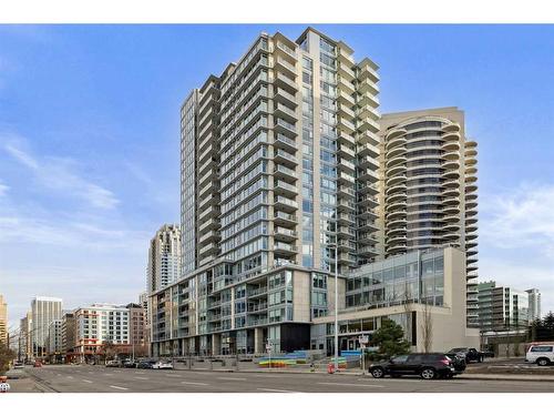 703-1025 5 Avenue Sw, Calgary, AB - Outdoor With Balcony With Facade