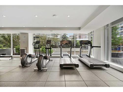 703-1025 5 Avenue Sw, Calgary, AB - Indoor Photo Showing Gym Room