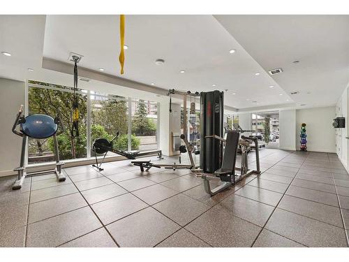 703-1025 5 Avenue Sw, Calgary, AB - Indoor Photo Showing Gym Room