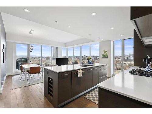 703-1025 5 Avenue Sw, Calgary, AB - Indoor Photo Showing Kitchen With Double Sink With Upgraded Kitchen