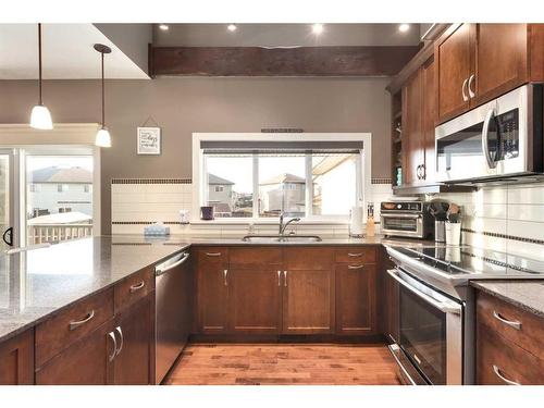 1803 High Park Boulevard Nw, High River, AB - Indoor Photo Showing Kitchen With Double Sink