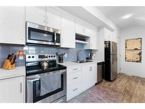 4006-100 Walgrove Court Se, Calgary, AB - Indoor Photo Showing Kitchen With Double Sink