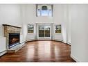 105-1720 13 Street Sw, Calgary, AB  - Indoor Photo Showing Living Room With Fireplace 