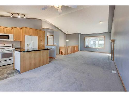 313 Robert Street Sw, Diamond Valley, AB - Indoor Photo Showing Kitchen