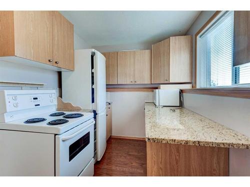 313 Robert Street Sw, Diamond Valley, AB - Indoor Photo Showing Kitchen