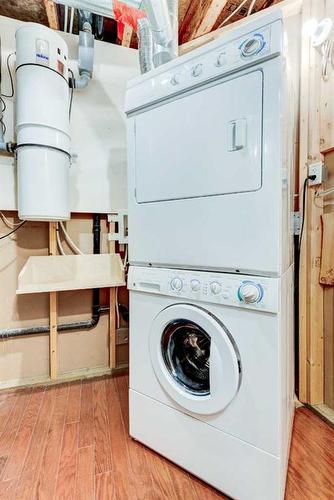 313 Robert Street Sw, Diamond Valley, AB - Indoor Photo Showing Laundry Room