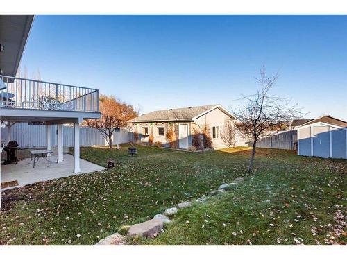 313 Robert Street Sw, Diamond Valley, AB - Outdoor With Deck Patio Veranda