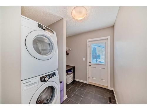 2103 New Brighton Park Se, Calgary, AB - Indoor Photo Showing Laundry Room