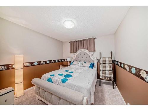 2103 New Brighton Park Se, Calgary, AB - Indoor Photo Showing Bedroom