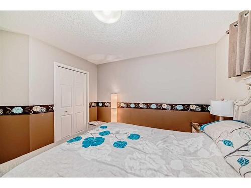 2103 New Brighton Park Se, Calgary, AB - Indoor Photo Showing Bedroom