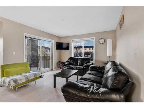 226-355 Taralake Way Ne, Calgary, AB - Indoor Photo Showing Living Room