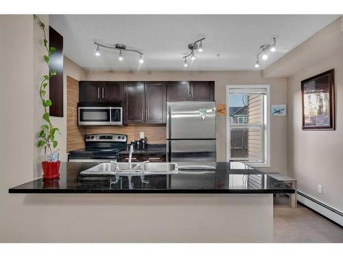 226-355 Taralake Way Ne, Calgary, AB - Indoor Photo Showing Kitchen With Stainless Steel Kitchen With Double Sink