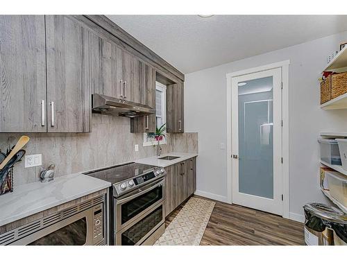 7 Mystic Ridge Way Sw, Calgary, AB - Indoor Photo Showing Kitchen With Upgraded Kitchen