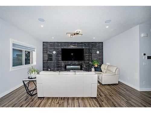 7 Mystic Ridge Way Sw, Calgary, AB - Indoor Photo Showing Living Room With Fireplace