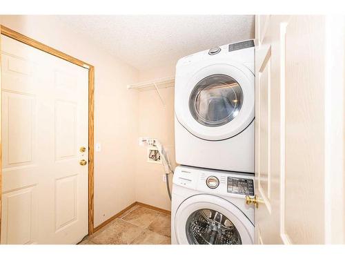 200 Somerglen Common Sw, Calgary, AB - Indoor Photo Showing Laundry Room