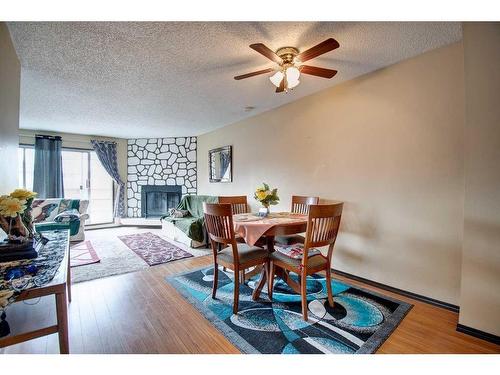 4730 70 Street Nw, Calgary, AB - Indoor With Fireplace