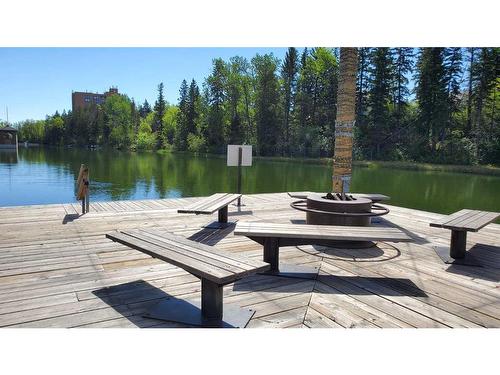 4730 70 Street Nw, Calgary, AB - Outdoor With Body Of Water With Deck Patio Veranda