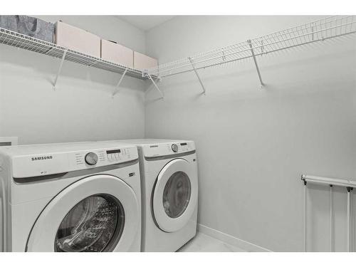 124-42 Cranbrook Gardens Se, Calgary, AB - Indoor Photo Showing Laundry Room