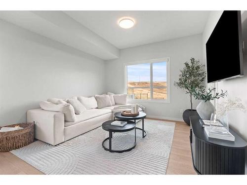 124-42 Cranbrook Gardens Se, Calgary, AB - Indoor Photo Showing Living Room