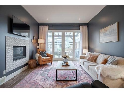 4202 19 Street Sw, Calgary, AB - Indoor Photo Showing Living Room With Fireplace