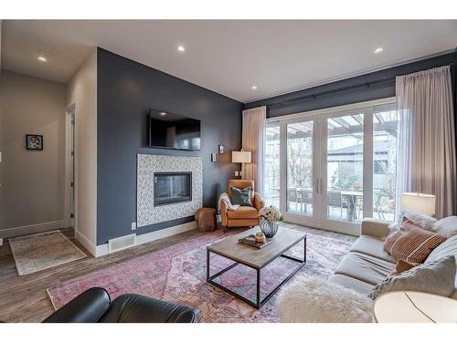 4202 19 Street Sw, Calgary, AB - Indoor Photo Showing Living Room With Fireplace