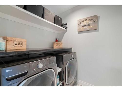 1457 Aldrich Place, Carstairs, AB - Indoor Photo Showing Laundry Room