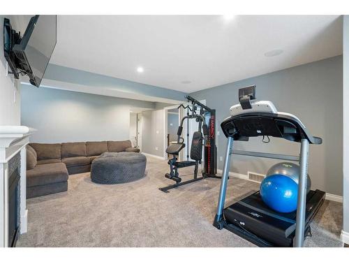 1457 Aldrich Place, Carstairs, AB - Indoor Photo Showing Gym Room