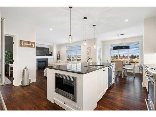 1457 Aldrich Place, Carstairs, AB - Indoor Photo Showing Kitchen With Upgraded Kitchen