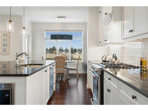 1457 Aldrich Place, Carstairs, AB - Indoor Photo Showing Kitchen With Upgraded Kitchen